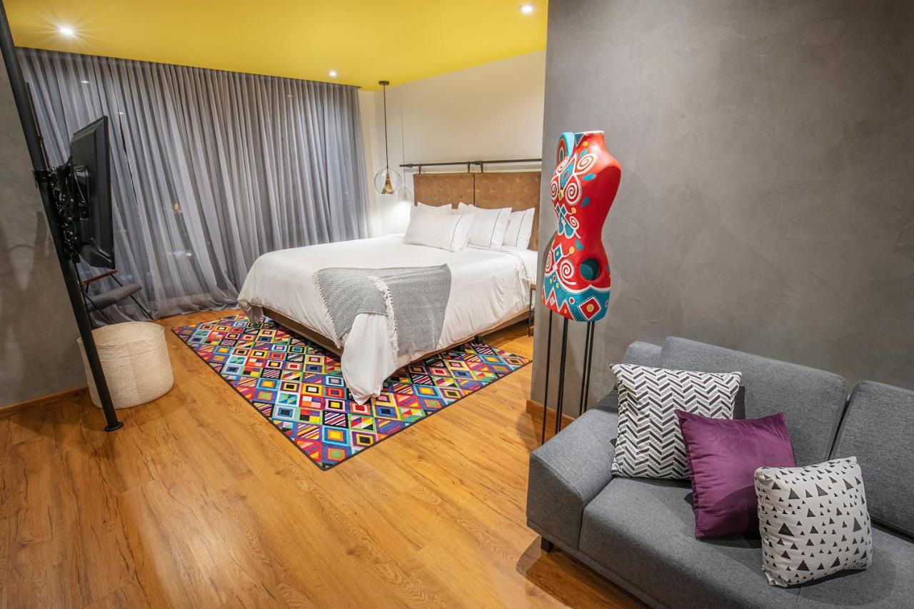 פאסטו Hotel V1501 מראה חיצוני תמונה A bedroom at the hotel