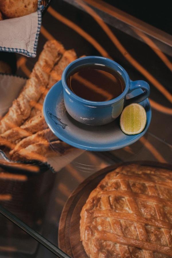 פאסטו Hotel V1501 מראה חיצוני תמונה A cup of coffee with a slice of lime